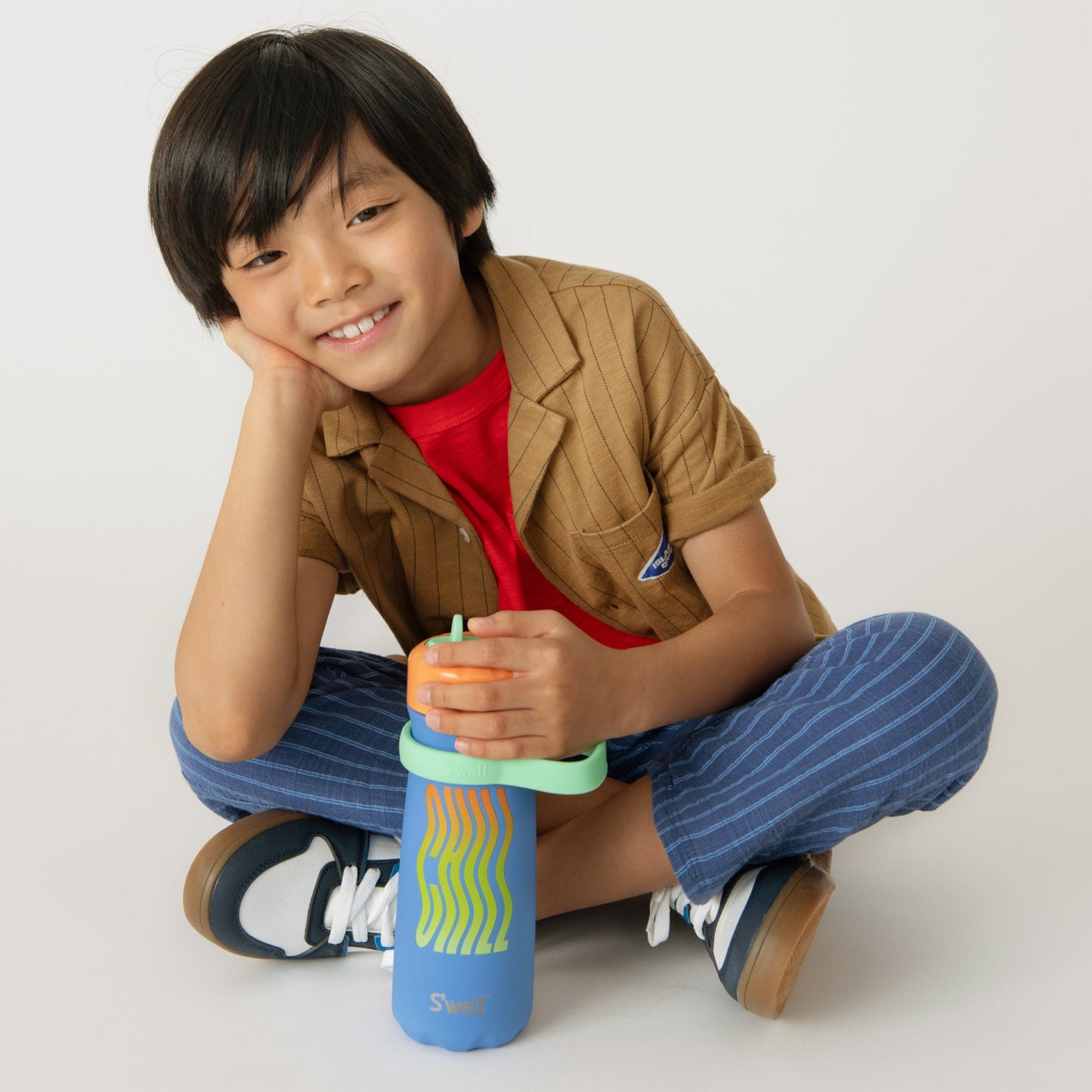 traveler-with-flip-straw-lid-16oz-v9 Swell-Kids-Water-Bottle-Traveler-16oz-Blue-Chill-Lifestyle.jpg